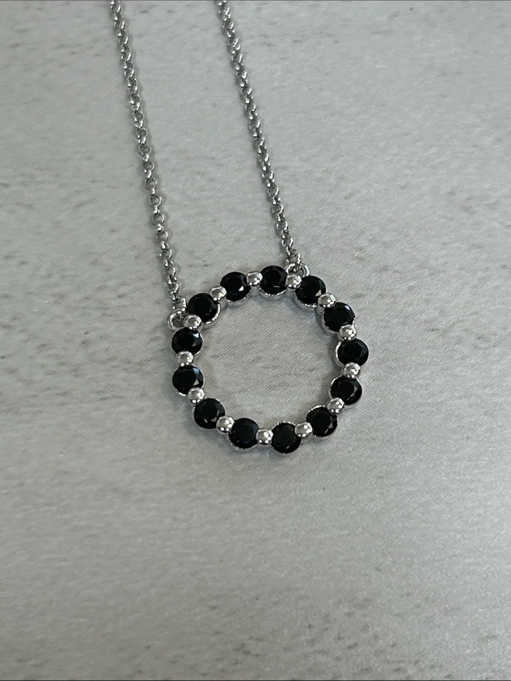 Bomb Party Silver Circle Pendant Necklace with Black Crystals